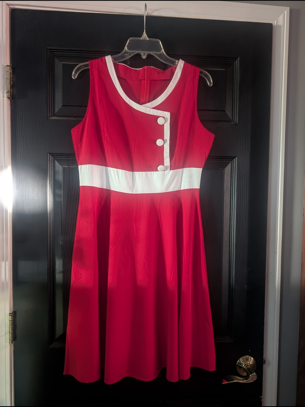 Retro-Inspired Red Sleeveless Dress with White Trim